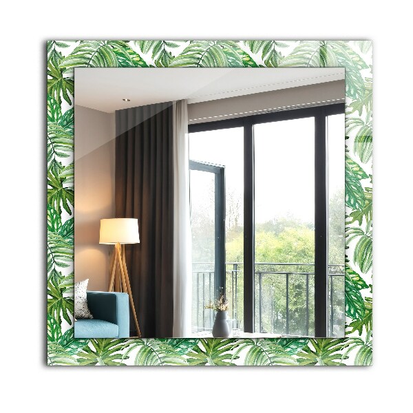 Espelho com moldura decorada com folhas verdes tropicais