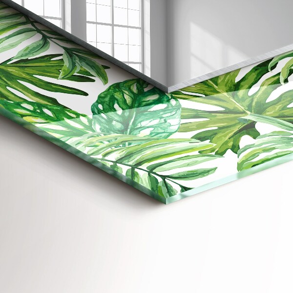 Espelho com moldura decorada com folhas verdes tropicais