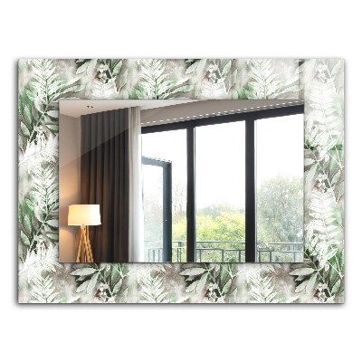 Espelho decorativo com desenho de folhas verdes