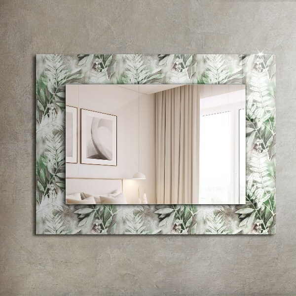 Espelho decorativo com desenho de folhas verdes