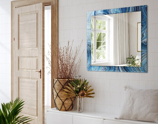 Espelho com moldura decorada com padrão abstrato azul
