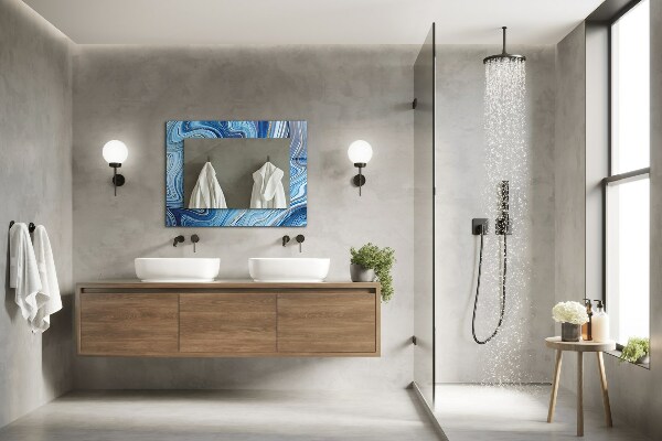 Espelho com moldura decorada com padrão abstrato azul