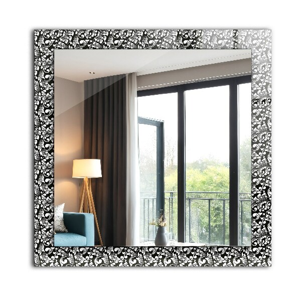 Espelho decorativo com ornamentos em preto e branco