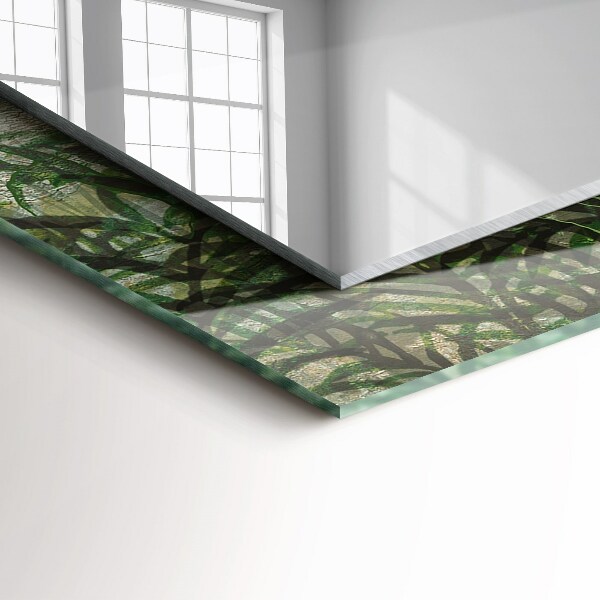 Espelho com moldura decorada com folhas de samambaia na cor verde