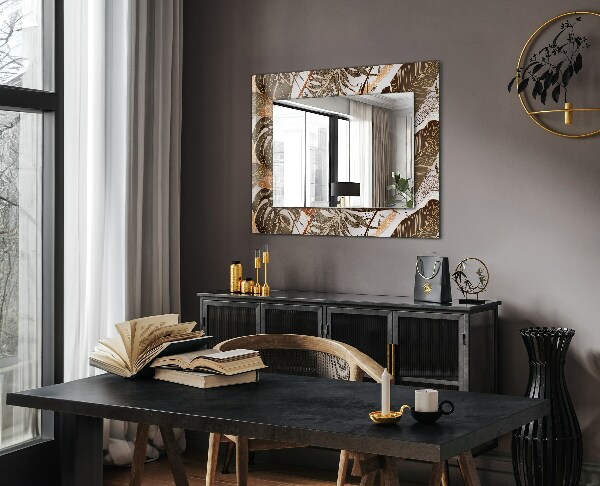 Espelho com moldura decorada com motivos de folhas tropicais