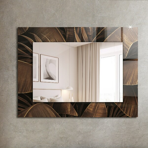 Espelho com moldura decorada com folhas tropicais