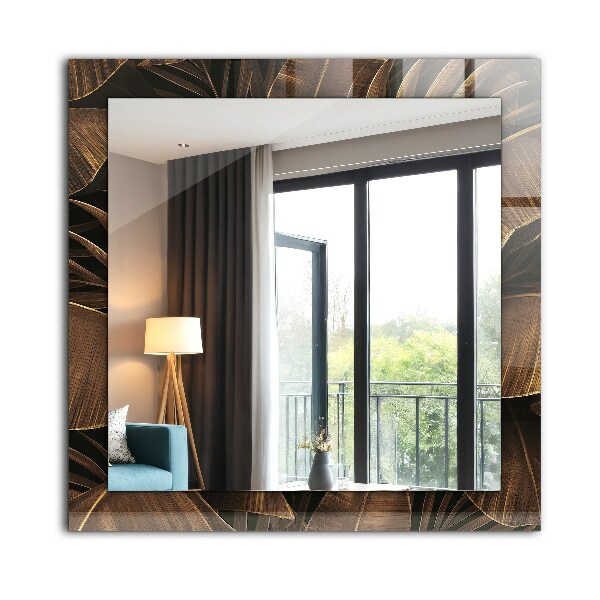 Espelho com moldura decorada com folhas tropicais