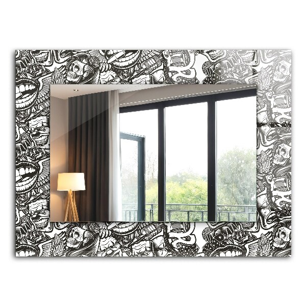 Espelho com moldura decorada em padrões preto e branco