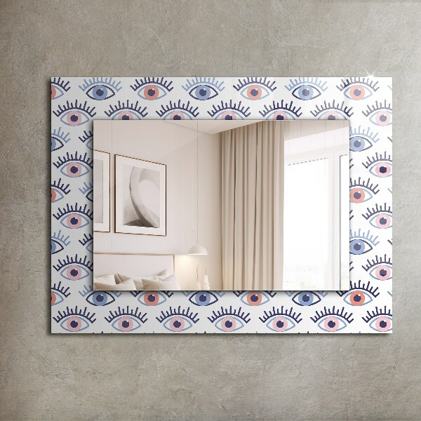 Espelho com moldura decorada com motivo de olho