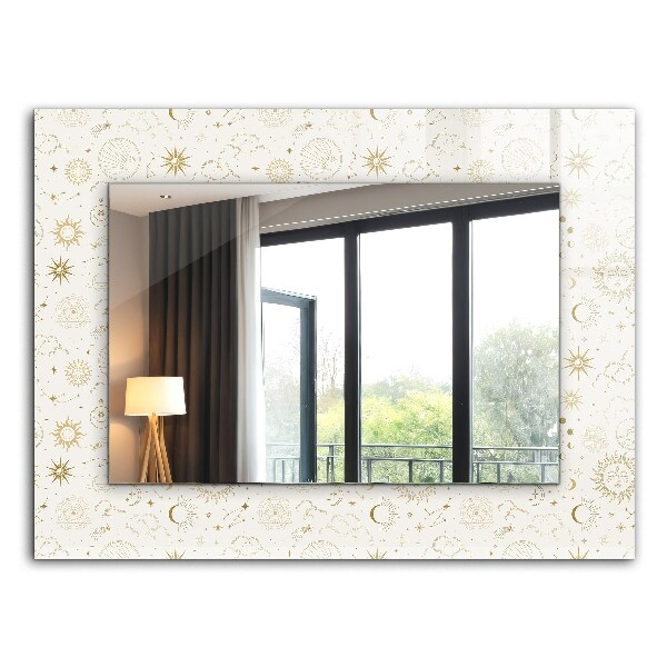 Espelho com moldura decorada com sol lua e estrelas