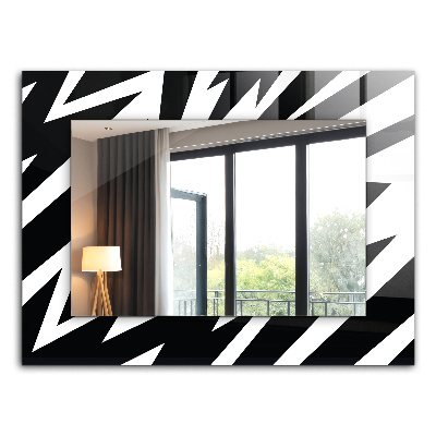 Espelho com moldura decorada com motivos geométricos em branco e preto