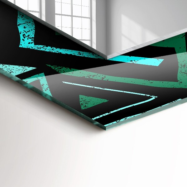 Espelho decorativo com motivos geométricos em turquesa
