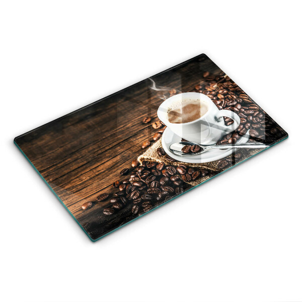 Cobertura de indução Uma xícara e grãos de café