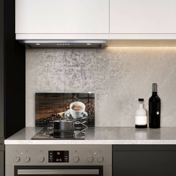 Cobertura de indução Uma xícara e grãos de café