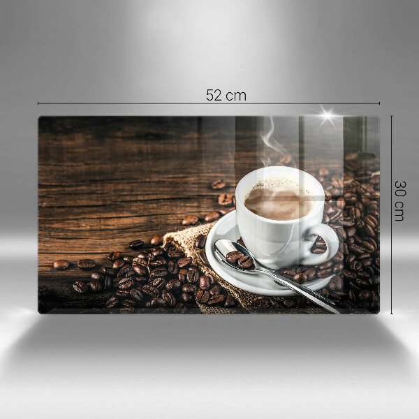 Cobertura de indução Uma xícara e grãos de café