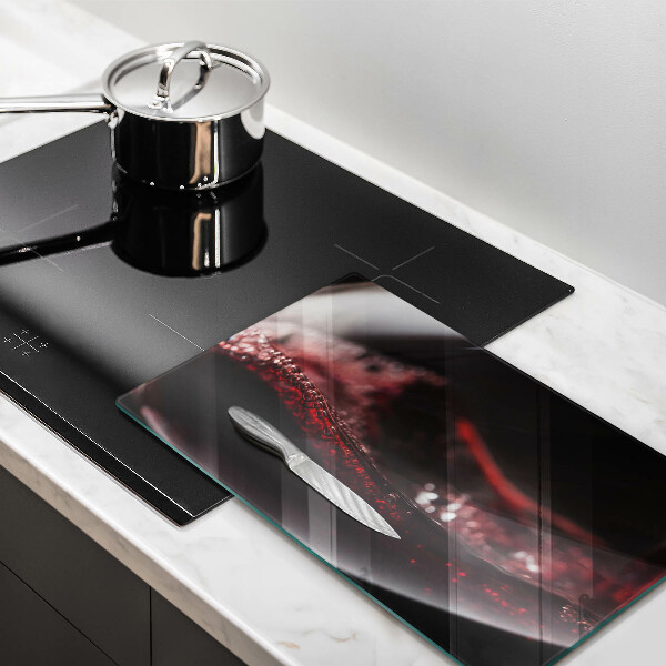 Cobertura de indução Um copo de vinho tinto