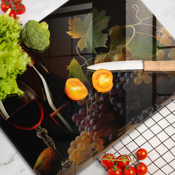 Tampa da placa de indução Um copo de vinho e uvas