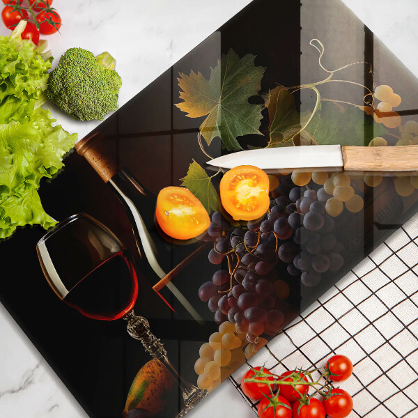 Tampa da placa de indução Um copo de vinho e uvas