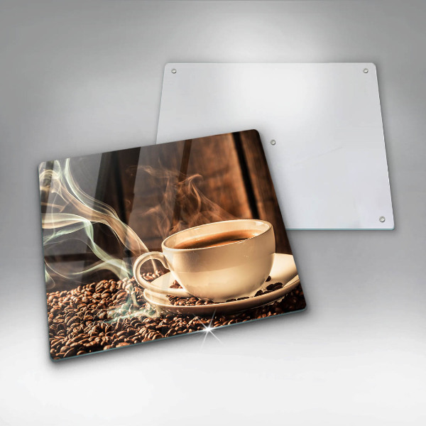 Tábua protetora Uma xícara e grãos de café