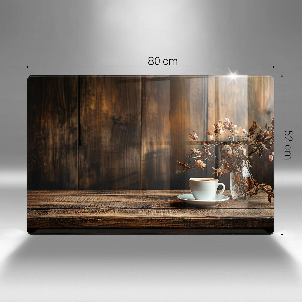 Cobertura placa vitrocerámica Uma xícara de café e madeira